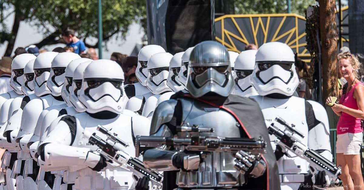 Captain Phasma leads stormtroopers in a striking Hollywood Studios parade, thrilling Star Wars fans at Walt Disney World.