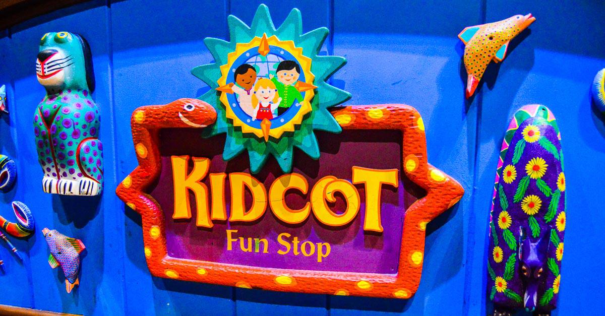 Kidcot Fun Stop sign with playful animal designs pops against a blue background—one of Disney World's must-try free activities.