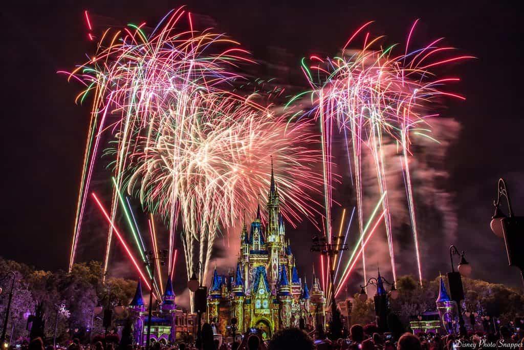 Fireworks dazzle above Cinderella Castle at Magic Kingdom, lighting up the night sky and enchanting Disney World guests.