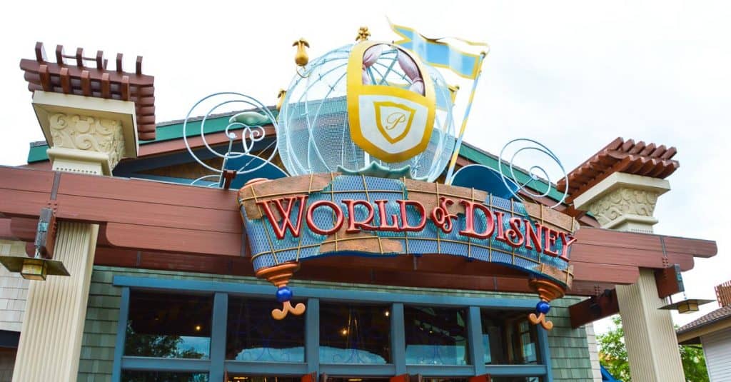 World of Disney’s vibrant entrance sign and globe welcome guests, hinting at magical souvenir finds just inside the Disney Springs store.