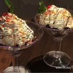 Delicious ice cream sundaes with whipped cream, sprinkles, chocolate drizzle, and cherries at Planet Hollywood in Disney World.