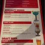 Planet Hollywood Observatory menu at Disney World with colorful cocktails, beers, souvenirs—perfect for theme park fans.