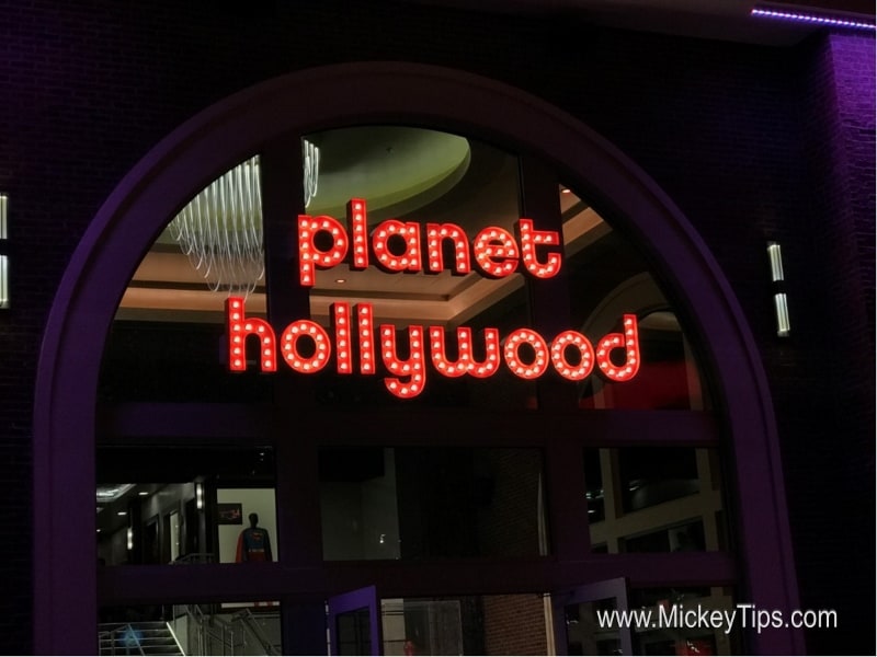 Illuminated "Planet Hollywood Observatory" sign marks the entrance; www.MickeyTips.com in corner, ideal for Disney fans.