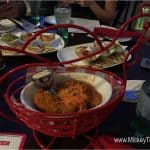 Crispy fried chicken in a red chicken basket at Planet Hollywood Observatory, a Disney World fan-favorite for meals and fun drinks.