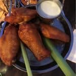 Buffalo chicken wings, celery sticks, and ranch dressing—just like the fan-favorite appetizer at Planet Hollywood in Disney World.