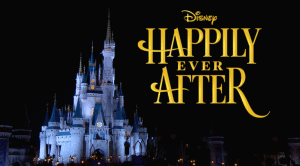 Cinderella Castle glowing at night during Happily Ever After, yellow title text shining as music enchants Magic Kingdom guests.