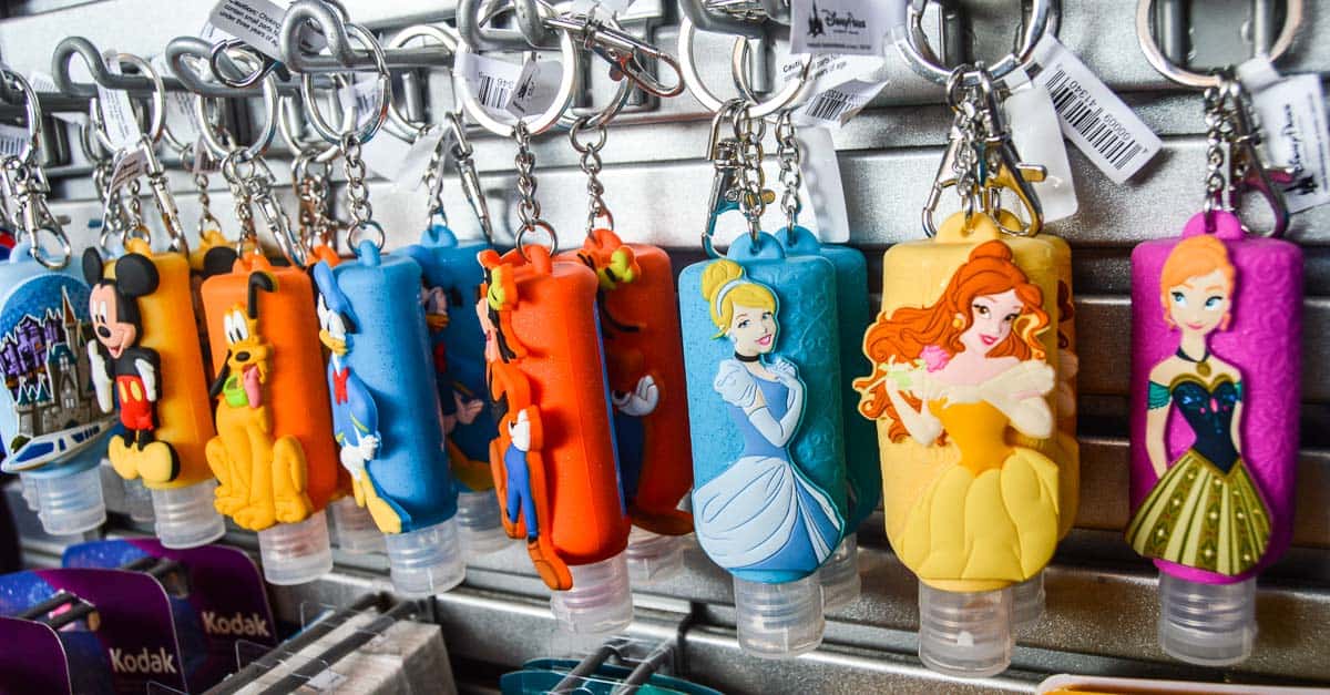 Disney-themed hand sanitizer holders on display, ready for your park adventures and must-have for Disney World visits.