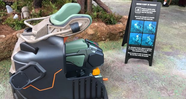 Avatar Flight of Passage test seat with green and black details, plus ride instructions, on display at Disney’s Animal Kingdom.