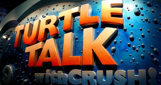 The vibrant "Turtle Talk with Crush!" sign pops against an underwater backdrop, inviting Disney World guests to catch showtimes.