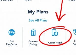 A red arrow and circle emphasize the "Order Food" button on a Disney World app menu—your key to faster dining in the parks.