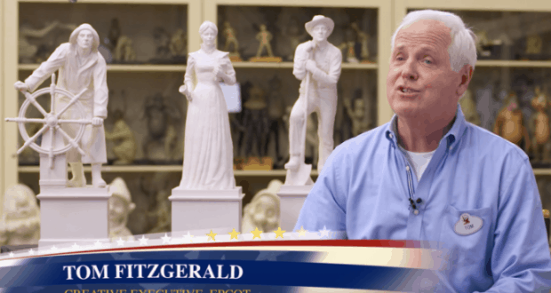 Imagineering legend Tom Fitzgerald, in a blue shirt, at Epcot’s American Adventure Pavilion with three white statues; name on screen.