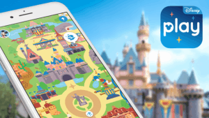 Disneyland map on a smartphone with Play Disney Parks App logo; Cinderella Castle blurs magically in the Walt Disney World backdrop.