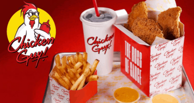 Crispy Chicken Guy! tenders, fries, drink, and sauces await at Disney World—served on a bold red backdrop for park fans.