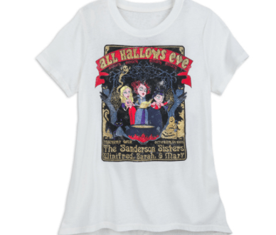 White tee with cartoon Sanderson Sisters from "Hocus Pocus" and "All Hallow's Eve" text, sold at ShopDisney for Disney fans.