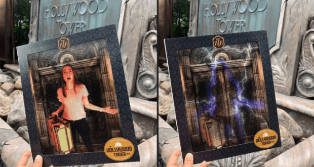 Guests hold photo frames with magical effects in front of Tower of Terror at Walt Disney World, capturing a memorable keepsake.