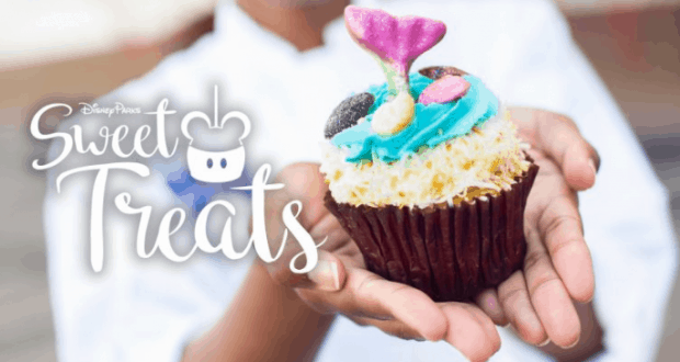 Cupcake with blue frosting, seashell candies, and a mermaid tail topper at Disney World. Text: “Sweet Treats.”.