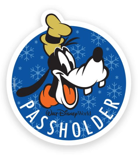 Goofy grins on a blue Annual Passholder sticker with snowflakes, highlighting exclusive perks for Walt Disney World fans.