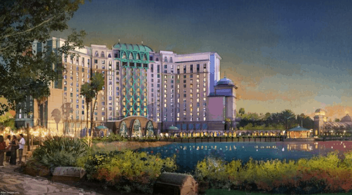 Gran Destino Tower glows with vibrant lights and lush greenery at sunset, a stunning landmark at Disney’s Coronado Springs Resort.