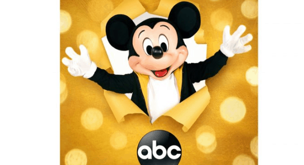 Mickey Mouse leaps through a yellow backdrop as the ABC logo shines below, marking 90 magical years of Disney entertainment.