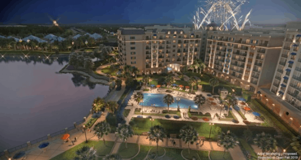 Disney's Riviera Resort glows beside its sparkling pool as dazzling fireworks burst over the lake at Walt Disney World.