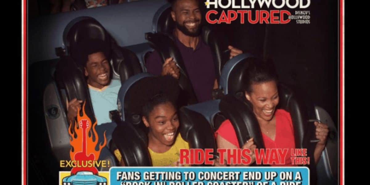 Four people smiling and laughing while riding a roller coaster at night. They are seated in two rows, wearing harnesses. A graphic on the image reads "Hollywood Captured" and "Ride This Way.