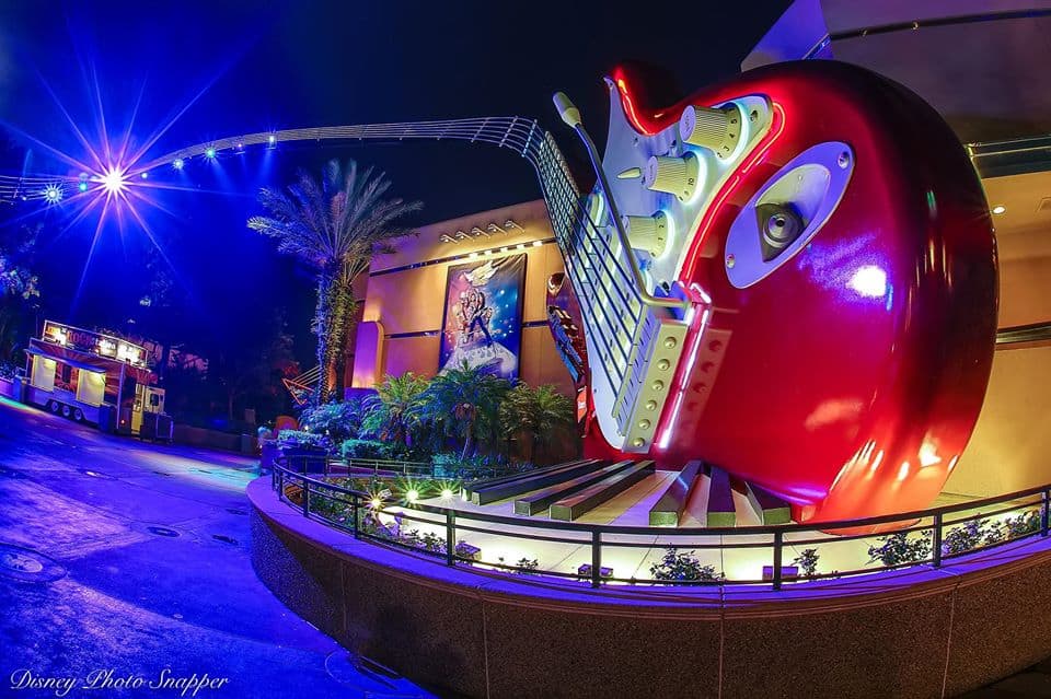 The towering red electric guitar at Rock 'n' Roller Coaster lights up the night—an iconic Disney’s Hollywood Studios photo spot.