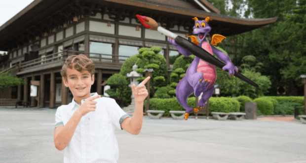A boy points excitedly at Figment, the purple dragon, wielding a giant paintbrush near Epcot's temple during Festival of the Arts.