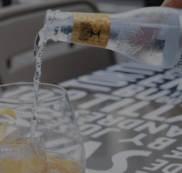 At Jaleo in Disney World, a crisp gin and tonic is poured over ice with a lemon twist, celebrating the Spring Gin & Tonic Fest.