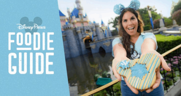 Disneyland guest enjoys a Mickey Mouse cookie; “Disney Parks Foodie Guide” showcases Walt Disney World and Arendelle Aqua treats.