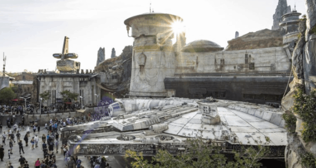 Fans explore the Millennium Falcon at Star Wars: Galaxy’s Edge, surrounded by immersive sights and crowds at Walt Disney World.