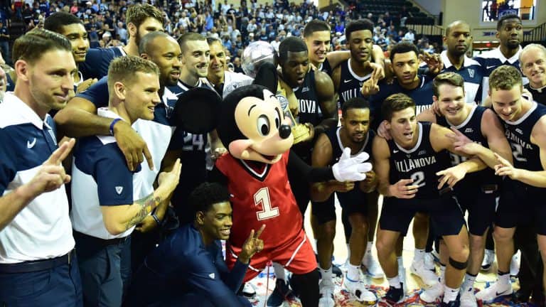 Mickey Mouse joins the Villanova basketball team for a cheerful group photo on court at Disney World’s 2019 Orlando Invitational.