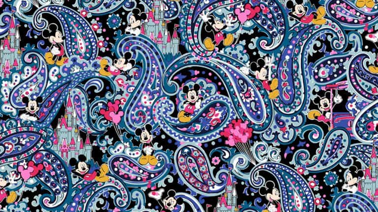 Disney-inspired paisley print featuring Mickey, Minnie, Cinderella Castle & hearts on dark fabric from the Vera Bradley Collection.