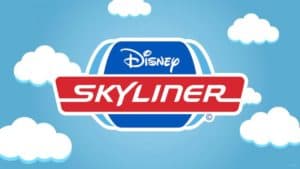 Disney Skyliner logo set against a blue sky and playful clouds, reflecting the whimsical spirit of Walt Disney World resorts.