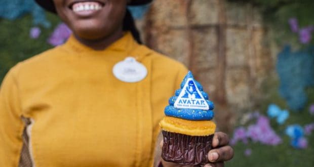 Celebrate Pandora with a cupcake topped with blue icing and an "Avatar" decoration at Disney’s Animal Kingdom.