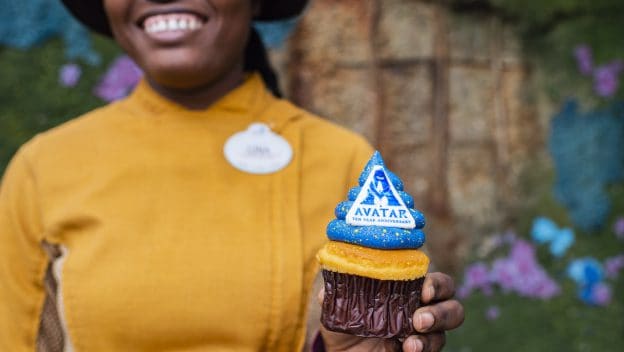 Celebrate Pandora with a cupcake topped with blue icing and an "Avatar" decoration at Disney’s Animal Kingdom.