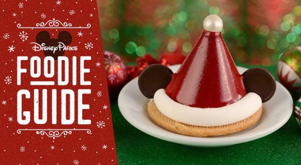 Mickey Mouse Santa hat dessert at Disney’s Hollywood Studios, displayed by the Foodie Guide sign for Holidays 2019 celebration.