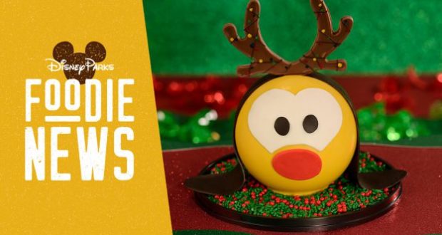 A reindeer dessert with red and green sprinkles at Disney Springs, next to a “Foodie News” sign, Dec 2019.