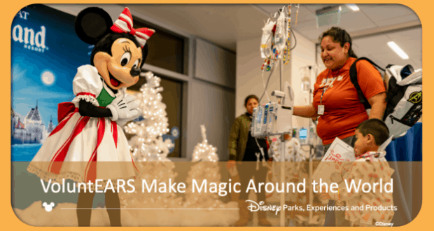 Minnie Mouse and Disney VoluntEARS bring holiday cheer to a hospital, delighting guests near sparkling white Christmas trees.