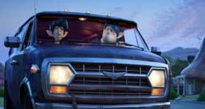 Ian and Barley Lightfoot ride in their beloved van through a whimsical fantasy suburb, as seen in Disney and Pixar’s Onward.