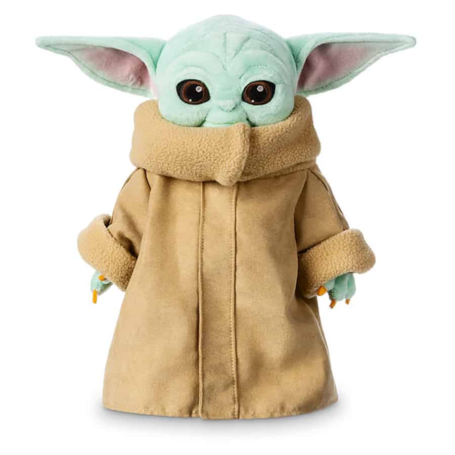 Grogu plush dressed in a tan coat, featuring oversized ears and wide eyes—a must-have souvenir for any Star Wars Land visitor.