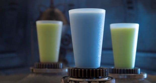 Three colorful frosty drinks in sleek, sci-fi cups highlight must-try alcoholic beverages at Walt Disney World lounges and bars.