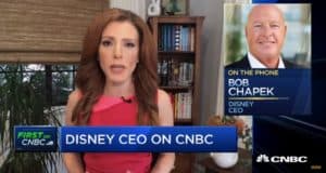Bob Chapek appears on CNBC as the anchor interviews him about Disney parks, movies, and more, with his photo shown during the segment.