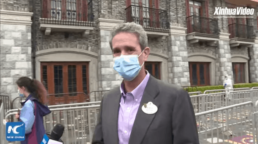 Shanghai Disneyland welcomes guests again on May 11, as seen in XinhuaVideo of a suited visitor masked outside the iconic entrance.