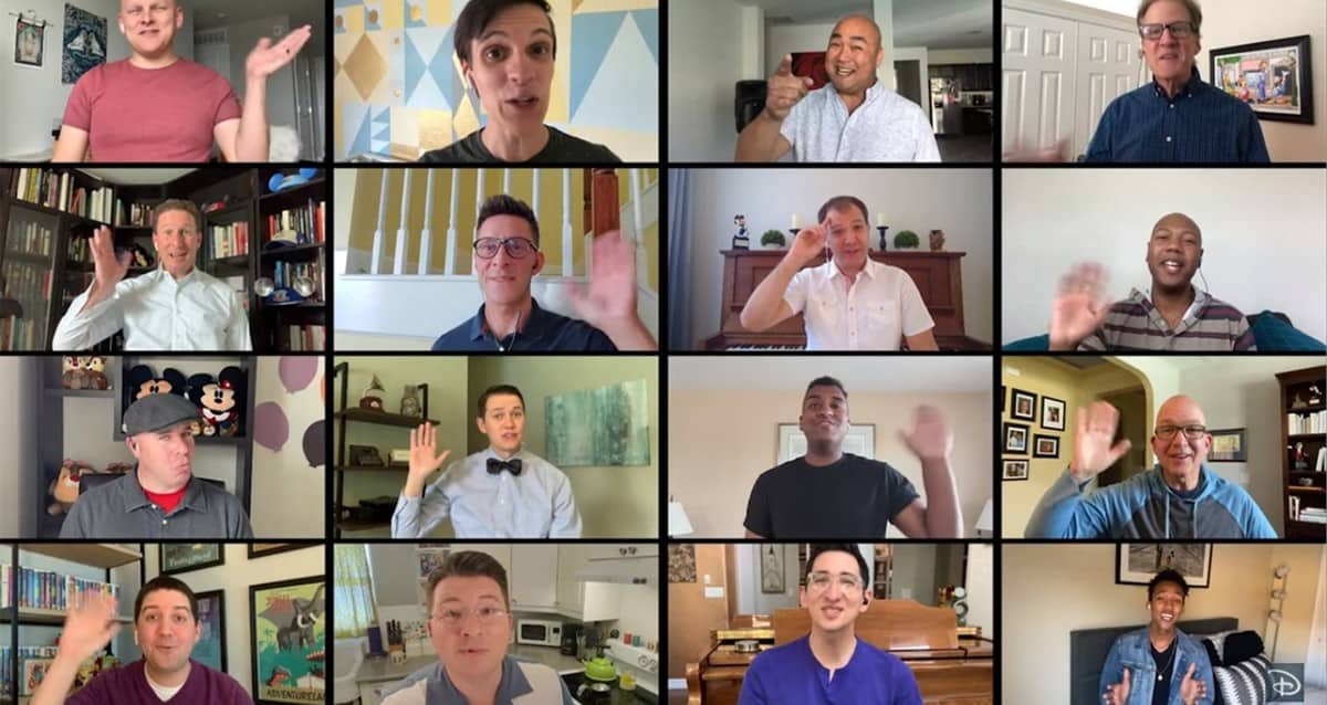 Sixteen friends wave and smile in a video call grid, each at home, sharing Disney magic reminiscent of Cinderella’s dreams.
