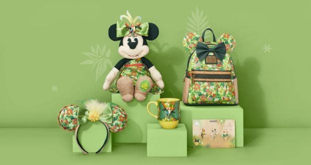 Collective Minnie Disney Tiki collection featuring plush, Mickey ears, mug, purse, and wallet on display for fans at the park.