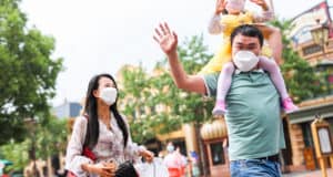 a family walking in shanghai disneyland