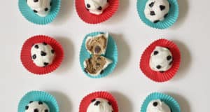 Soccer ball treats in vibrant wrappers, one revealing cookie dough, inspired by 101 Dalmatians for Disney Parks fans.