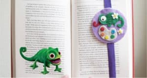 Storybook open to a fun chameleon page, featuring a playful lizard mascot and themed bookmark—perfect for family adventure fans.
