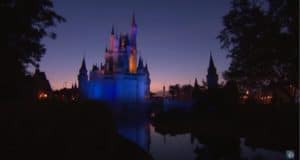Cinderella Castle aglow at dusk in Magic Kingdom, purple sky and shimmering reflection evoking Disney’s iconic enchantment.