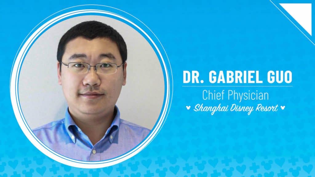 Dr. Gabriel Guo, Disney Health & Safety Team Chief Physician, at Shanghai Disney Resort, wearing glasses.
